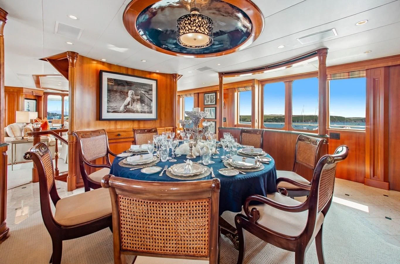 a dining room with a table and chairs aboard PACKAGE DEAL Yacht for Charter