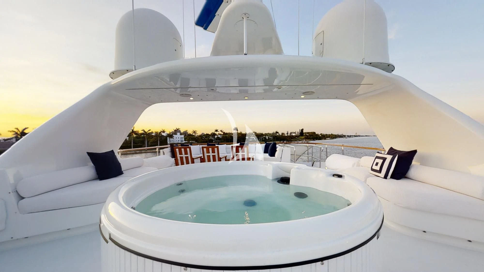 a white yacht with a blue pool aboard PACKAGE DEAL Yacht for Charter