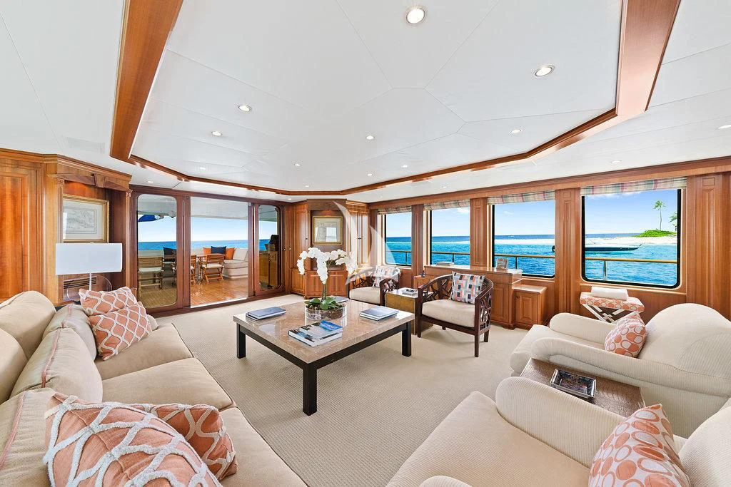 a living room with a large window aboard PACKAGE DEAL Yacht for Charter