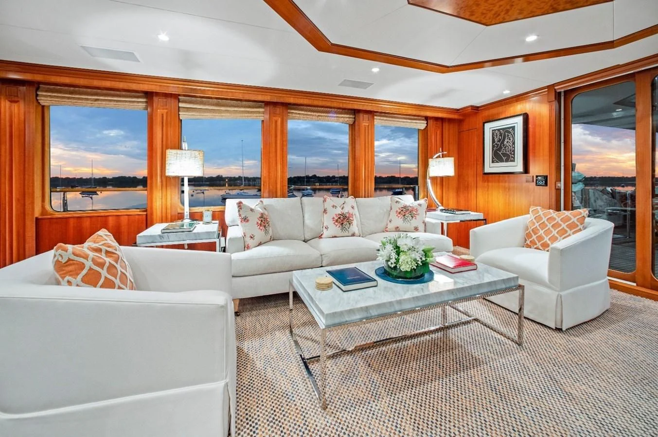 a living room with a large window aboard PACKAGE DEAL Yacht for Charter