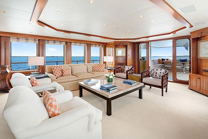 a living room with a large window aboard PACKAGE DEAL Yacht for Charter