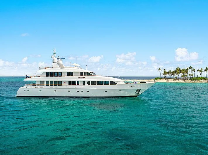 a large white boat in the water aboard PACKAGE DEAL Yacht for Charter