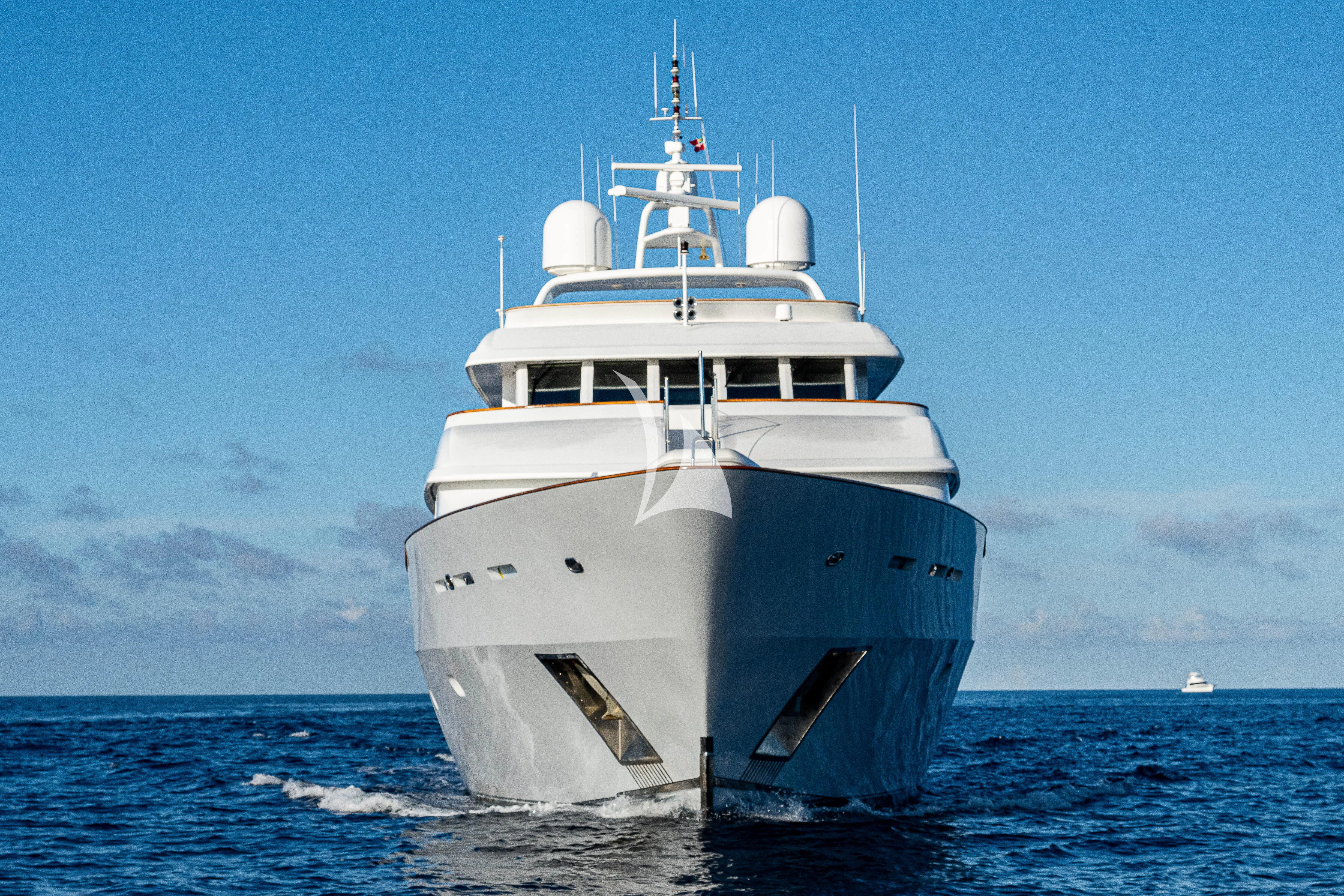 a large white boat in the water aboard PACKAGE DEAL Yacht for Charter