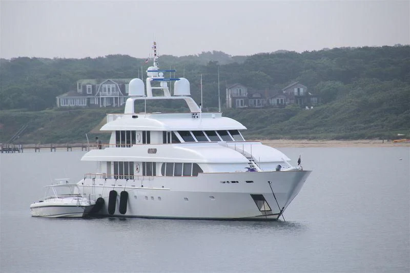 a large white boat in the water aboard PACKAGE DEAL Yacht for Charter