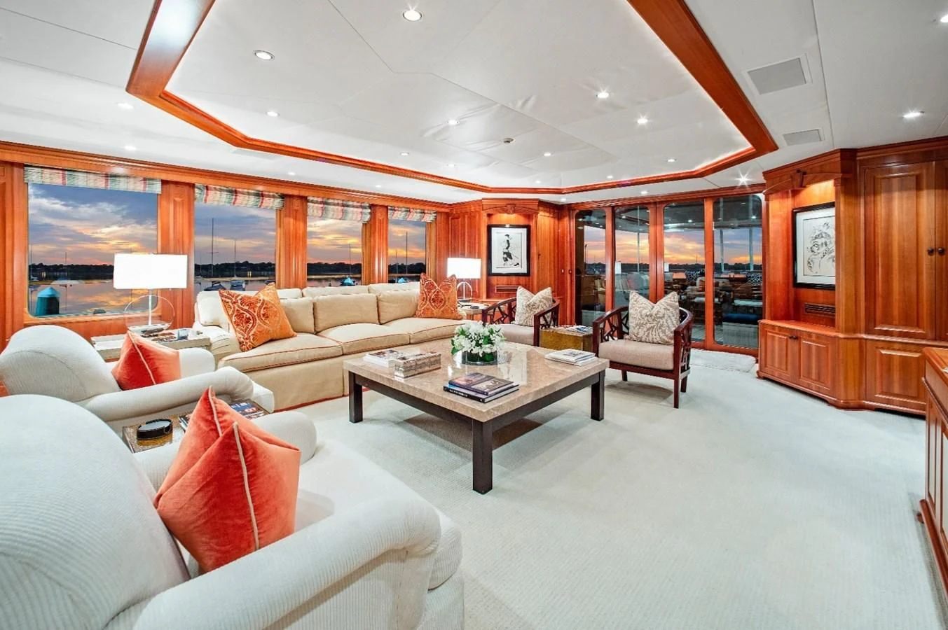 a living room with a table and chairs aboard PACKAGE DEAL Yacht for Charter