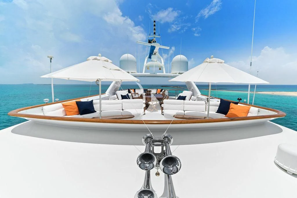 a boat with a satellite dish on the front aboard PACKAGE DEAL Yacht for Charter