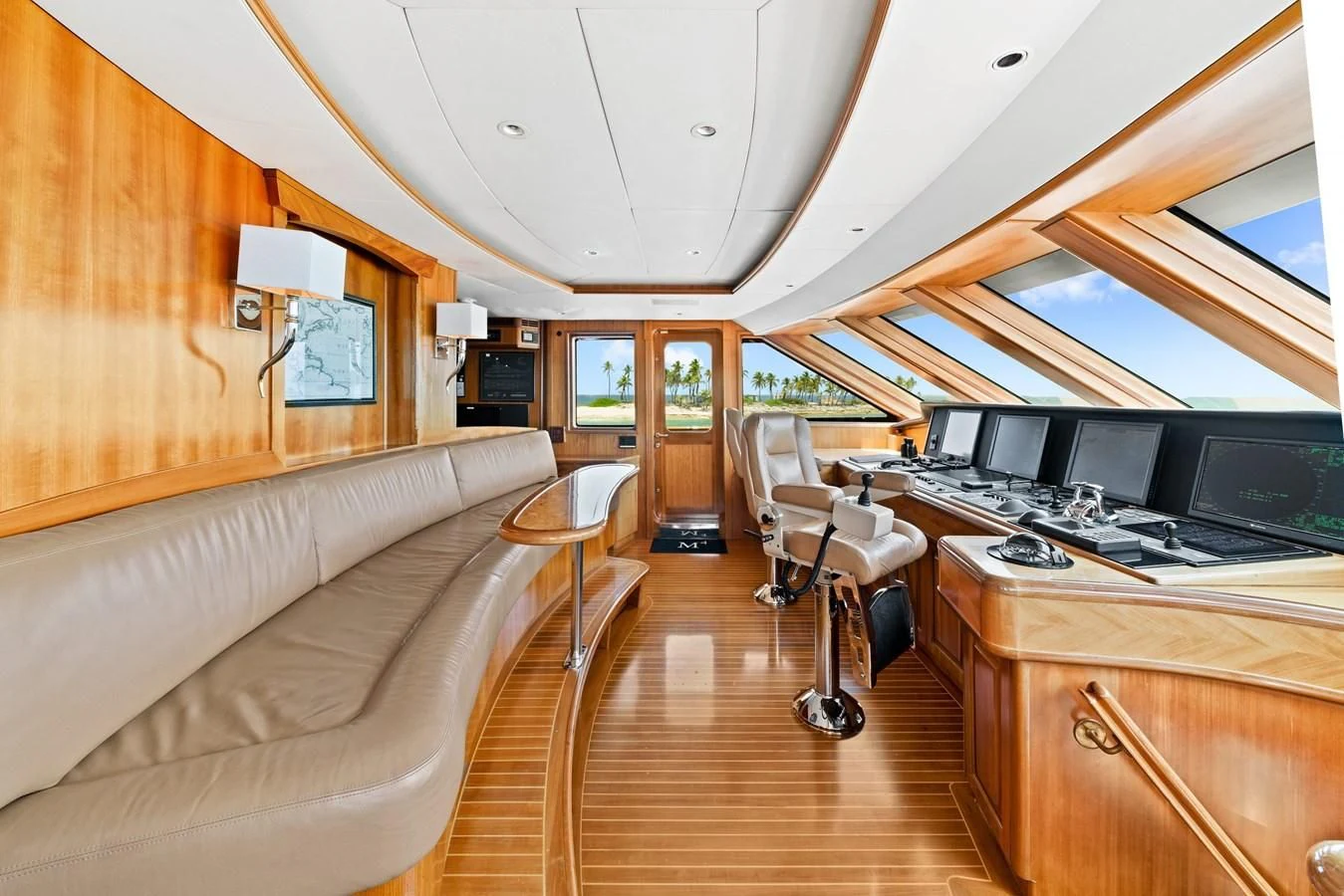 a room with a couch and a desk with a computer aboard PACKAGE DEAL Yacht for Charter