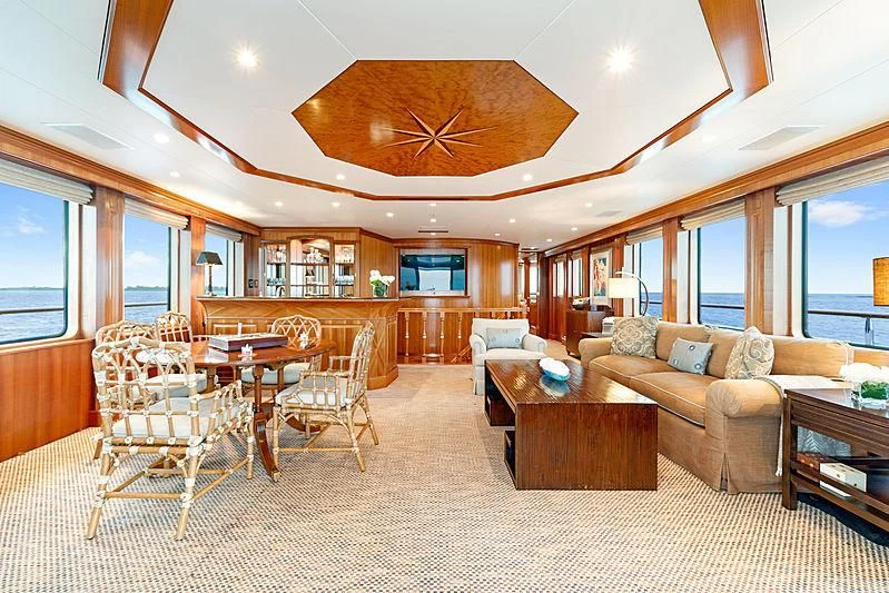 a living room with a large open ceiling aboard PACKAGE DEAL Yacht for Charter