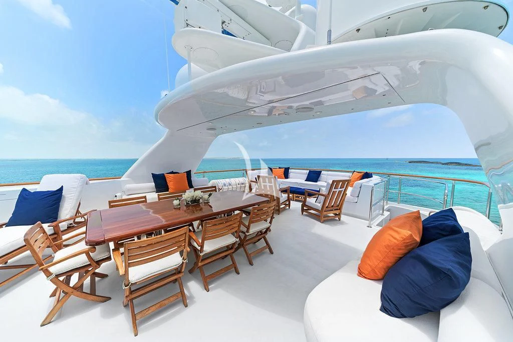 a large white boat on a large body of water aboard PACKAGE DEAL Yacht for Charter