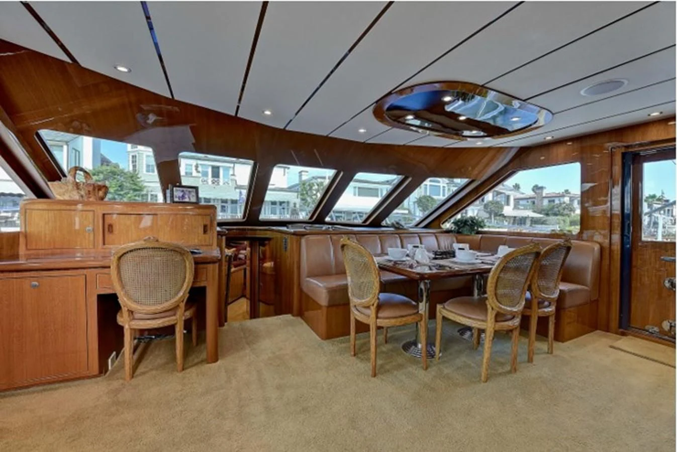a room with a table and chairs aboard ANACAPA Yacht for Sale