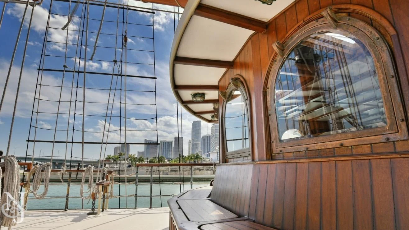 a large building with a large glass window aboard PEACEMAKER Yacht for Sale