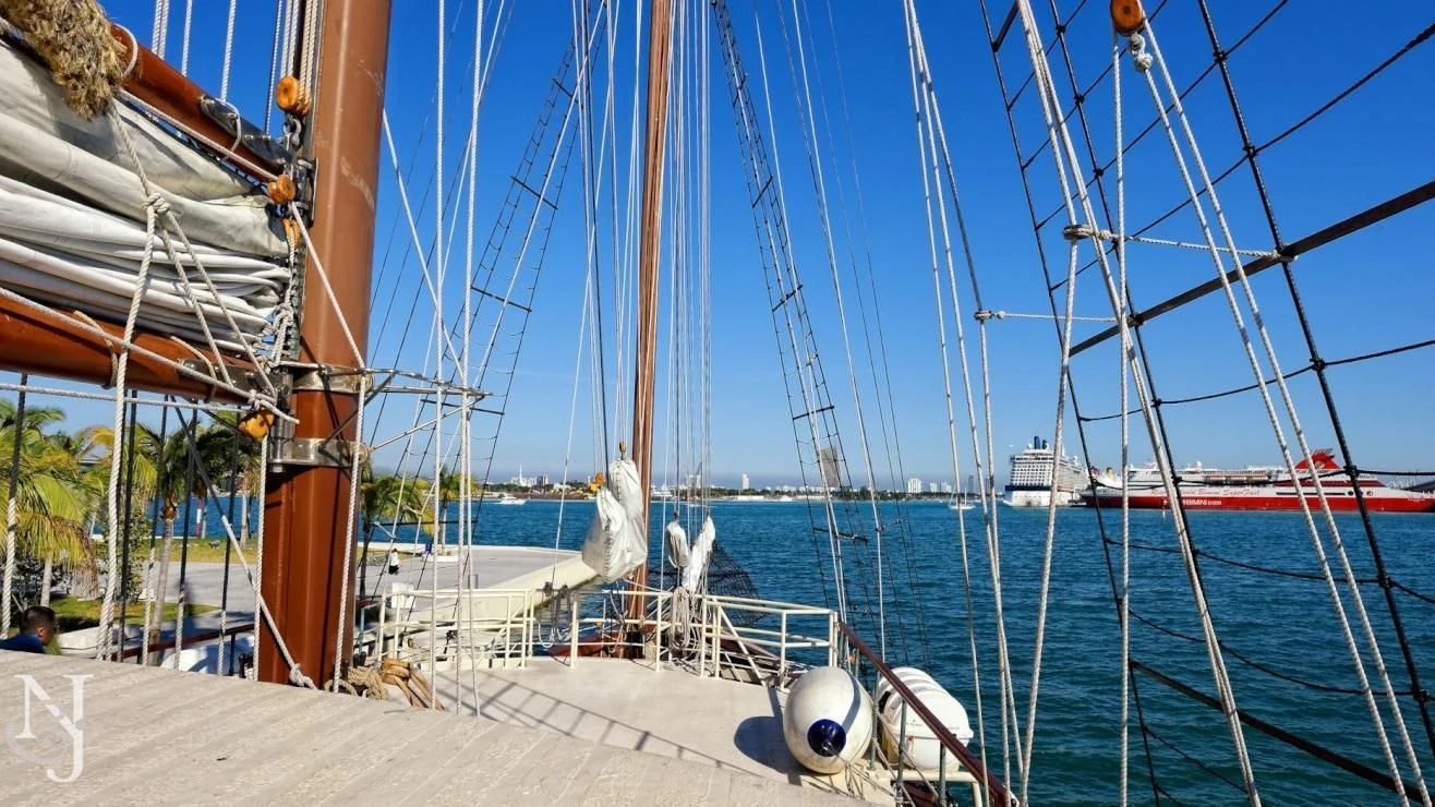 a boat docked at a pier aboard PEACEMAKER Yacht for Sale