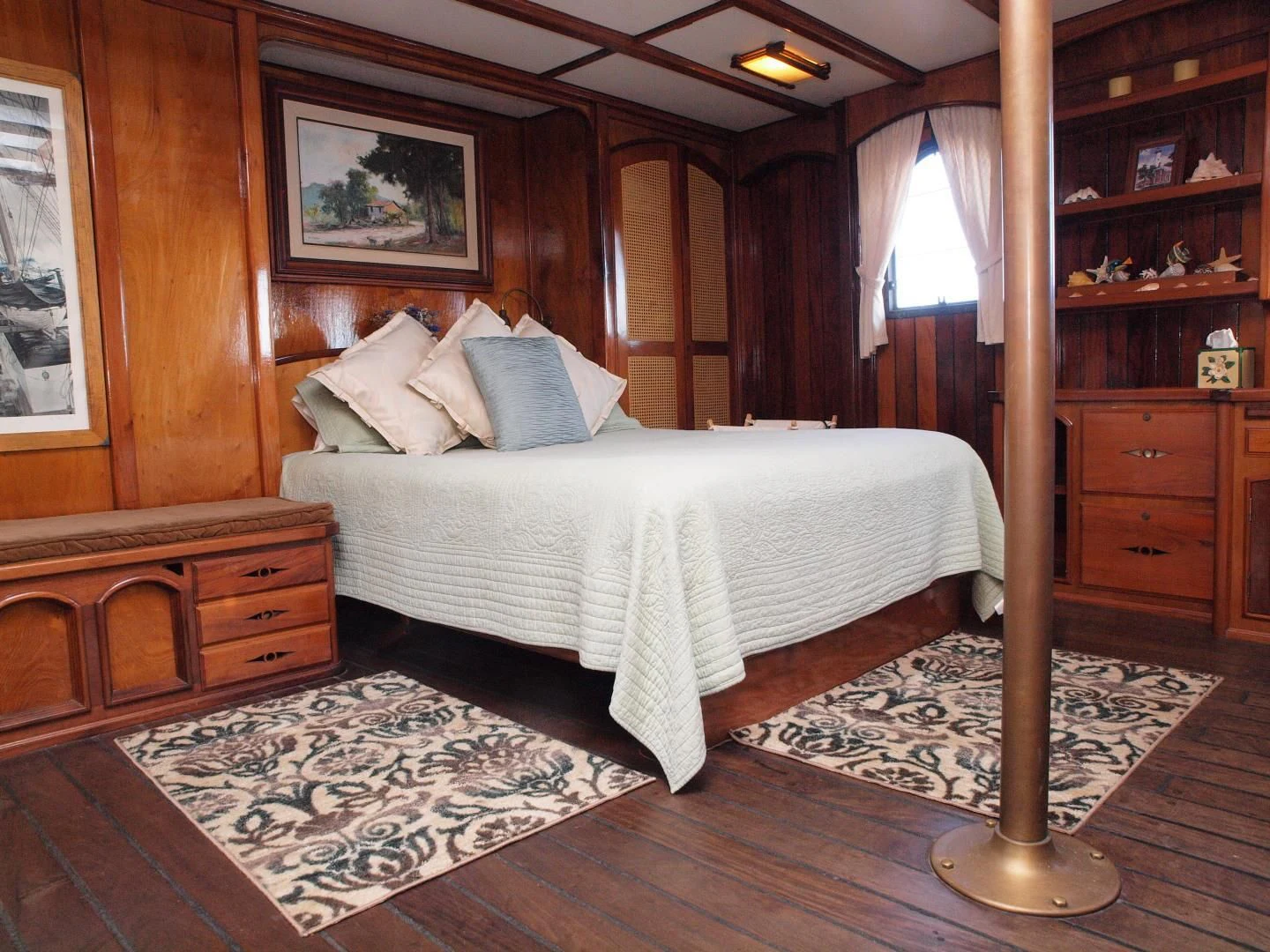 a bed in a room aboard PEACEMAKER Yacht for Sale