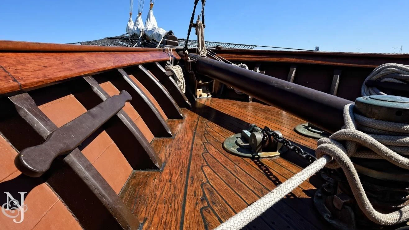 a boat on a dock aboard PEACEMAKER Yacht for Sale
