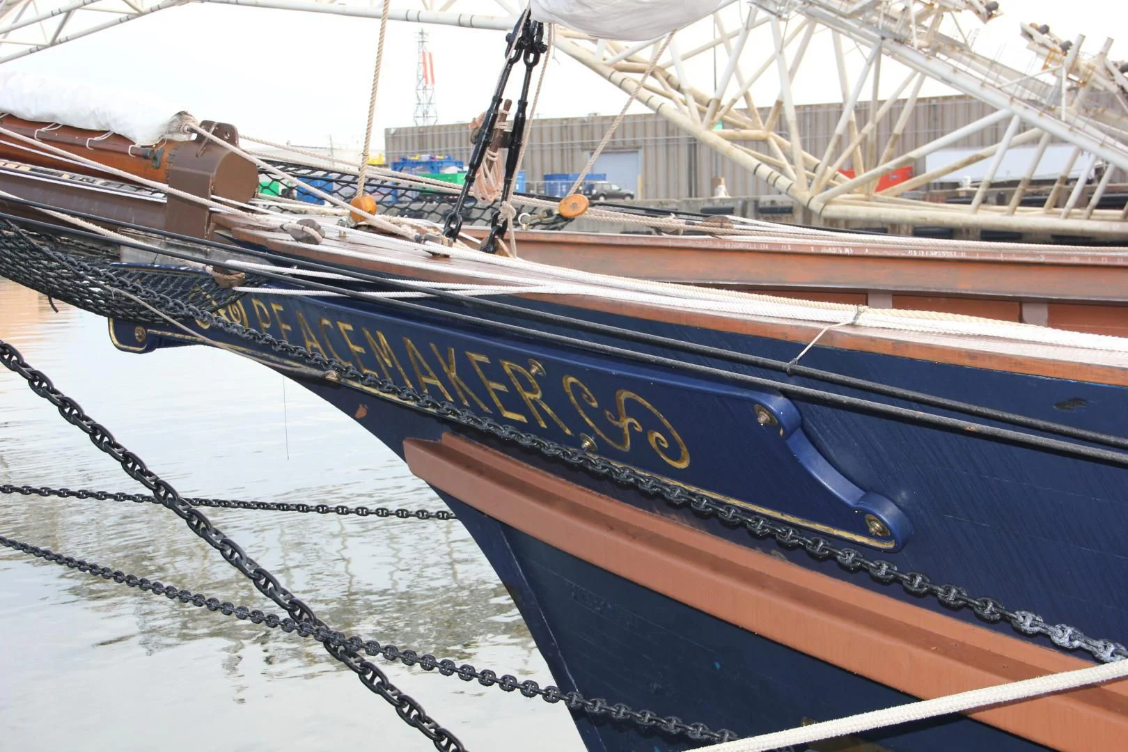 a boat tied to a dock aboard PEACEMAKER Yacht for Sale