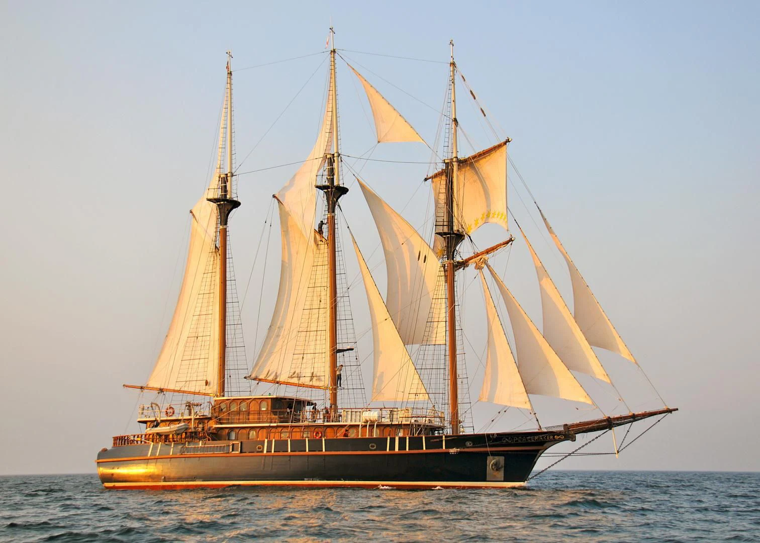 a large boat in the water aboard PEACEMAKER Yacht for Sale