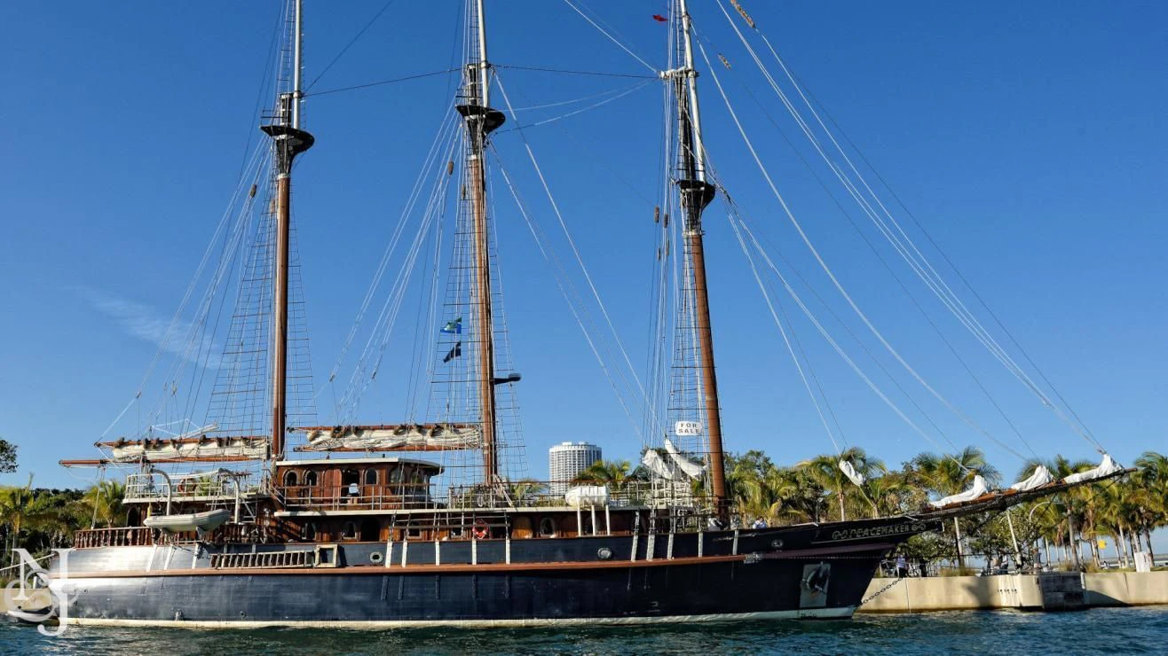 a large ship docked aboard PEACEMAKER Yacht for Sale
