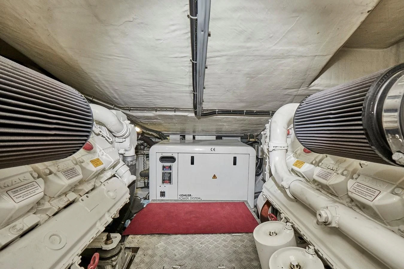 a white machine in a room aboard BLACK ICE Yacht for Sale