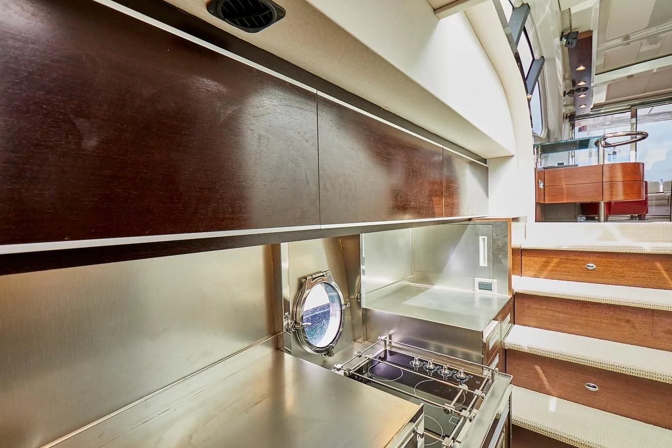 a kitchen with a large mirror aboard BLACK ICE Yacht for Sale