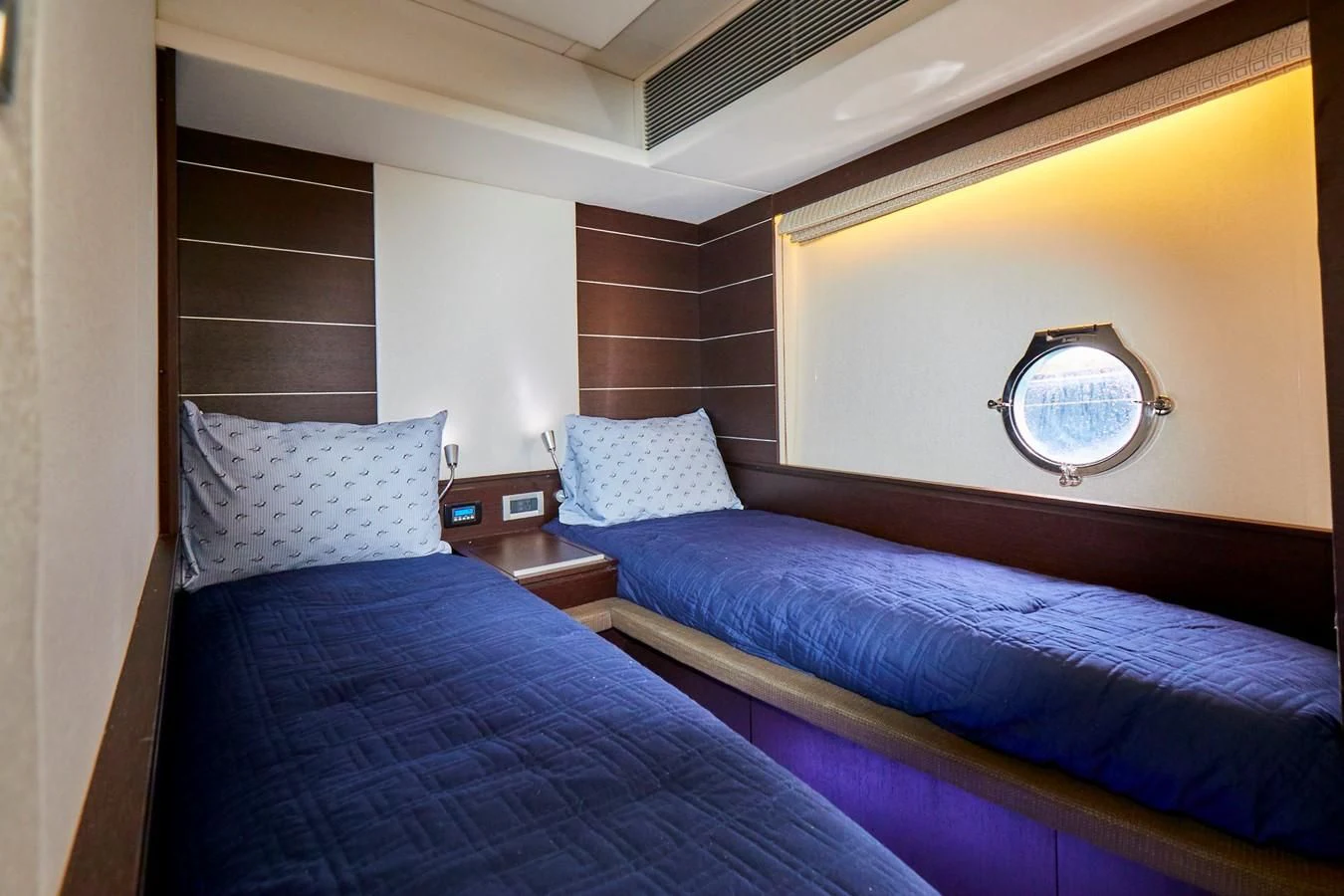 a couple of beds in a room aboard BLACK ICE Yacht for Sale