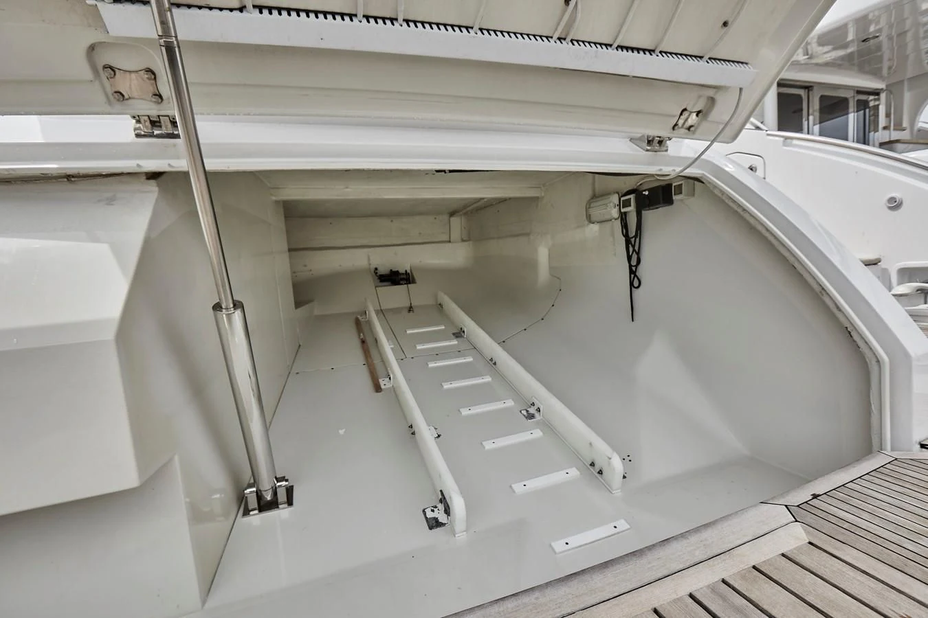 a white machine with pipes aboard BLACK ICE Yacht for Sale