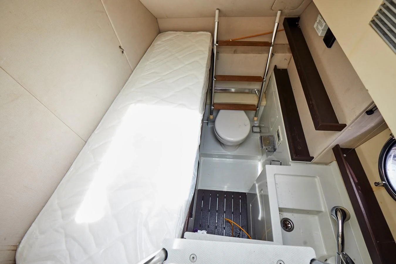 a toilet in a small room aboard BLACK ICE Yacht for Sale