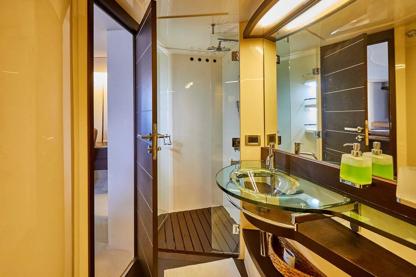 a bathroom with a large mirror aboard BLACK ICE Yacht for Sale