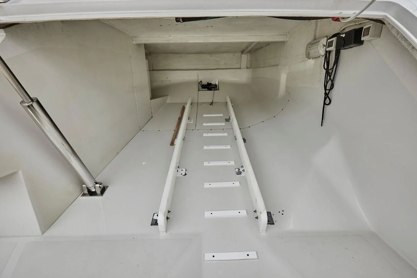 a staircase in a building aboard BLACK ICE Yacht for Sale
