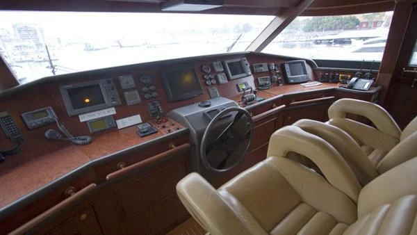 a room with a desk and a chair aboard MALUHEA Yacht for Sale