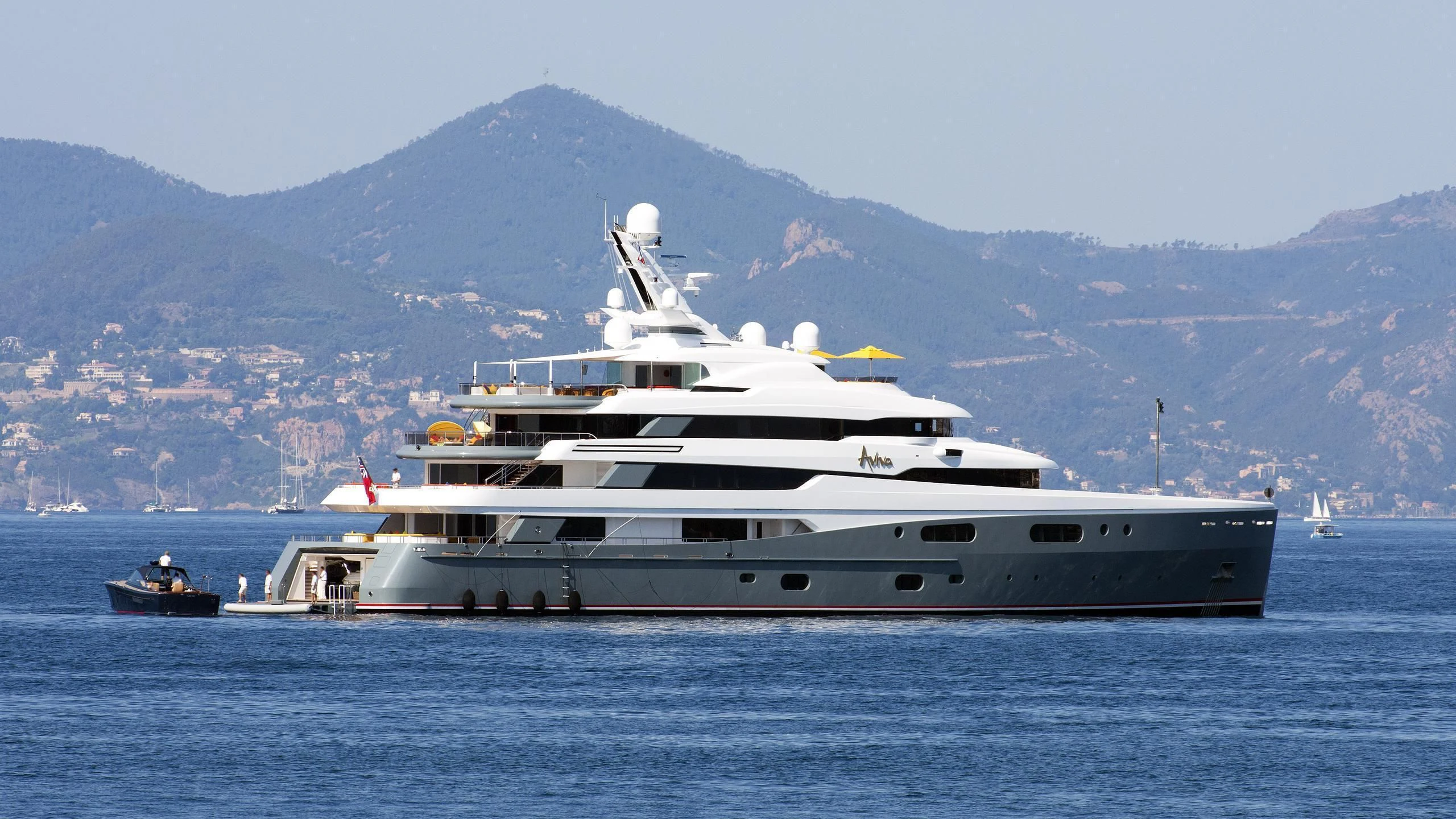 a large white yacht in the water aboard AVIVA Yacht for Sale
