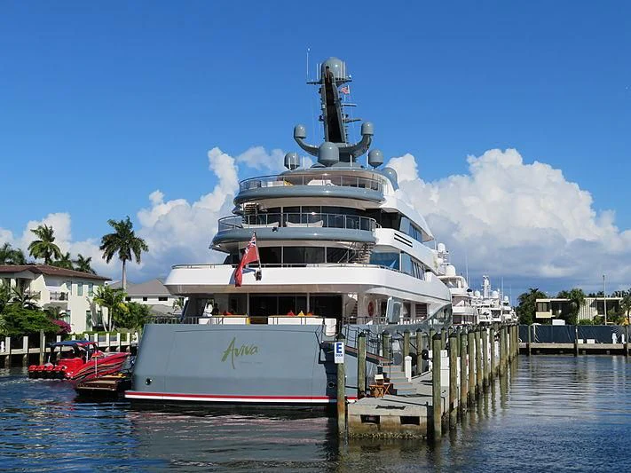 a large cruise ship docked aboard AVIVA Yacht for Sale