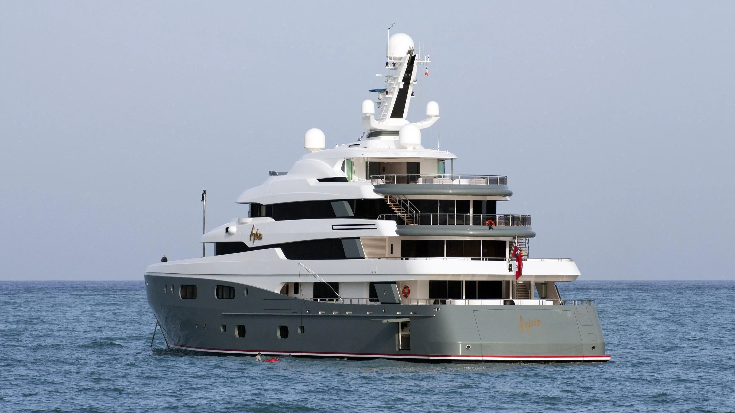 a large white ship in the water aboard AVIVA Yacht for Sale