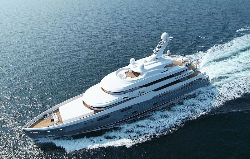 a white boat on the water aboard AVIVA Yacht for Sale