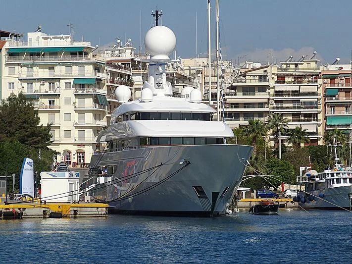 a large white ship docked aboard ILONA Yacht for Sale