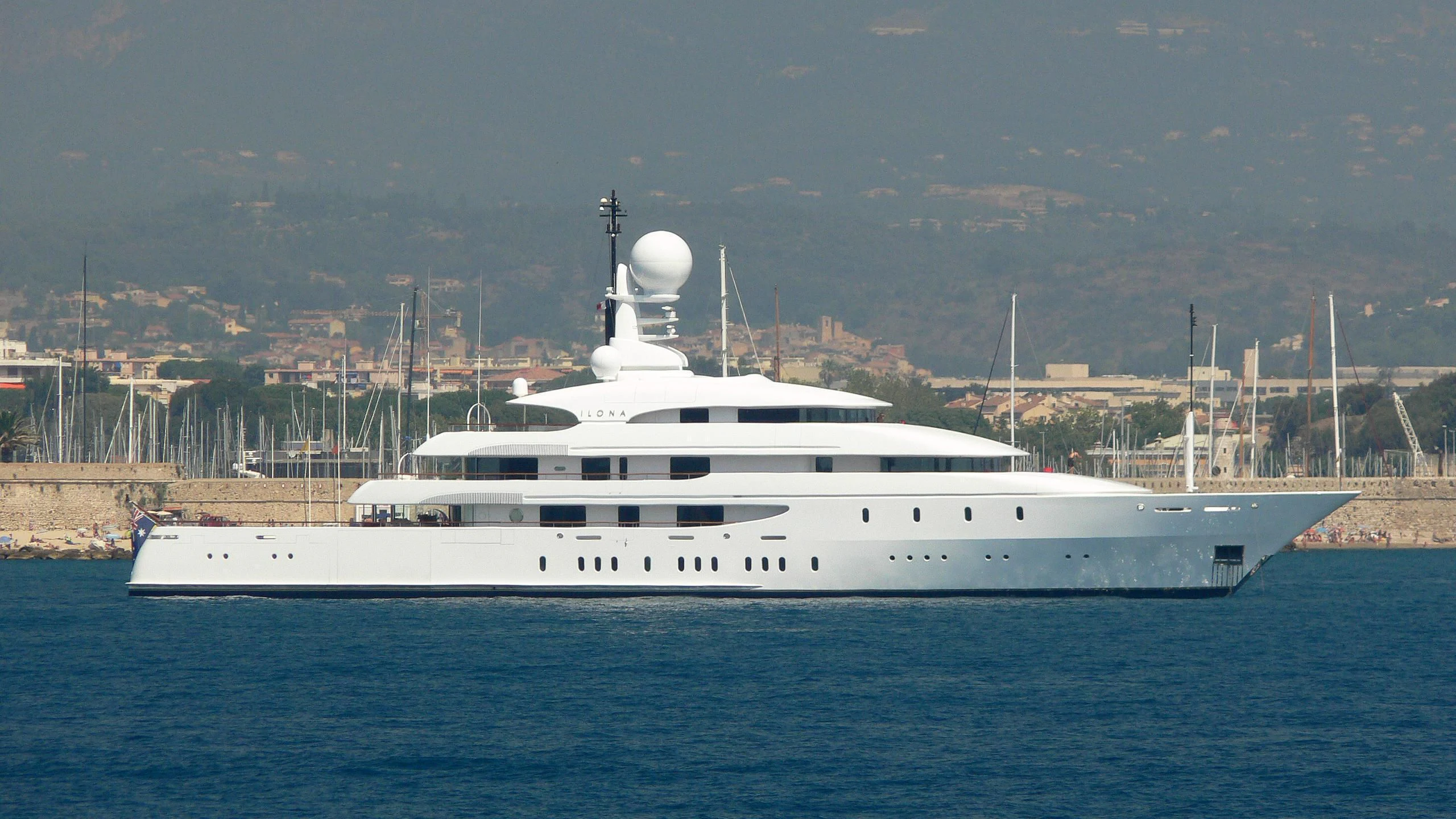 a white yacht in the water aboard ILONA Yacht for Sale