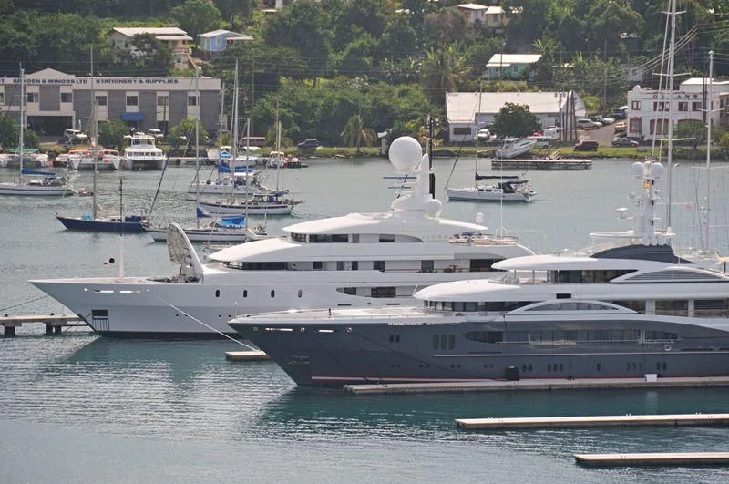 a large white yacht in the water aboard ILONA Yacht for Sale