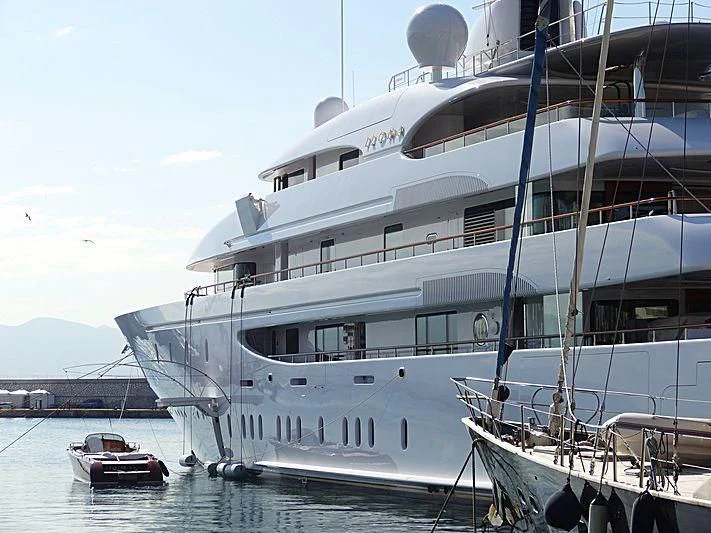 a large white yacht docked aboard ILONA Yacht for Sale