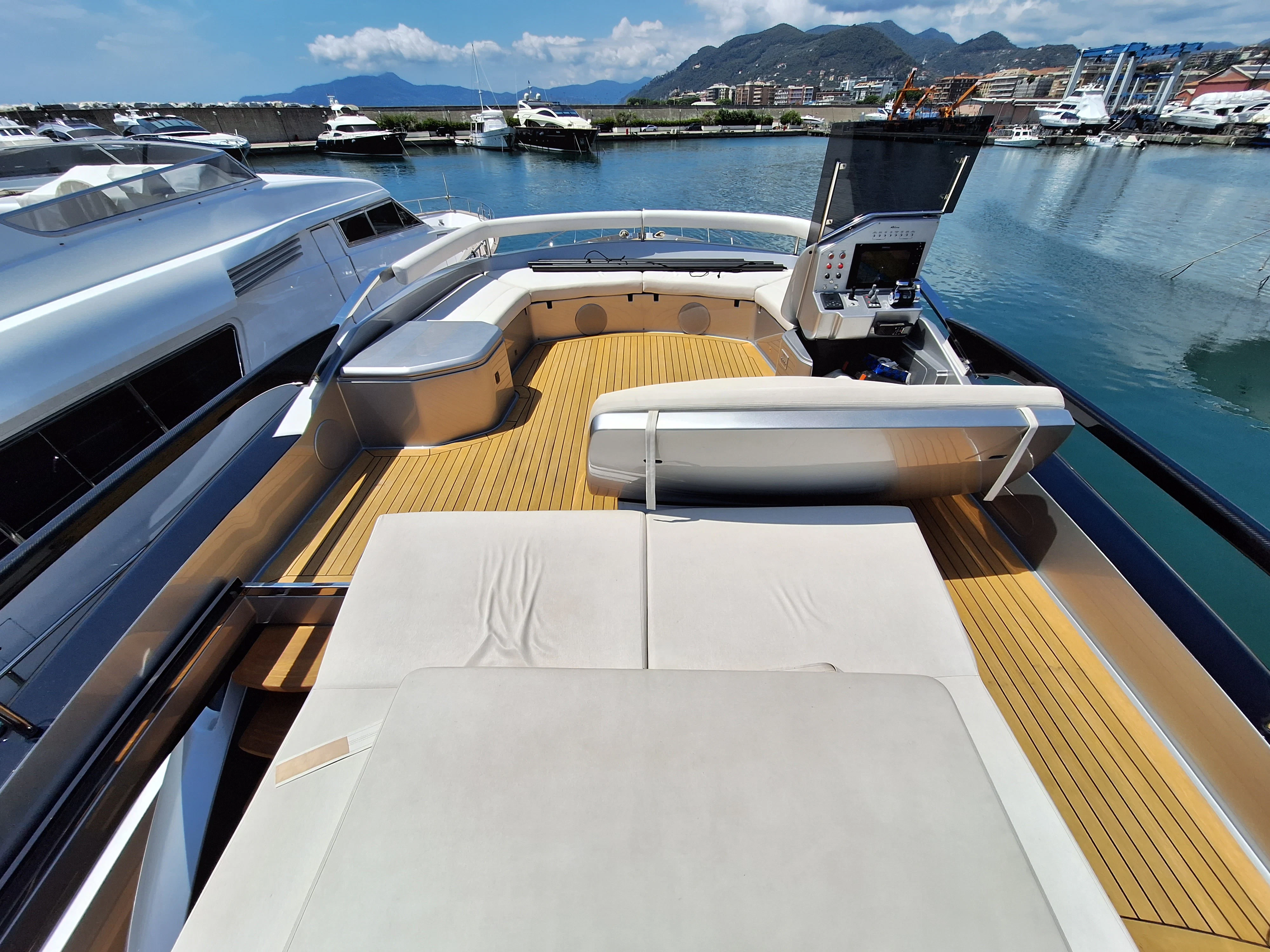a deck with a boat on it aboard CHILUCE Yacht for Charter