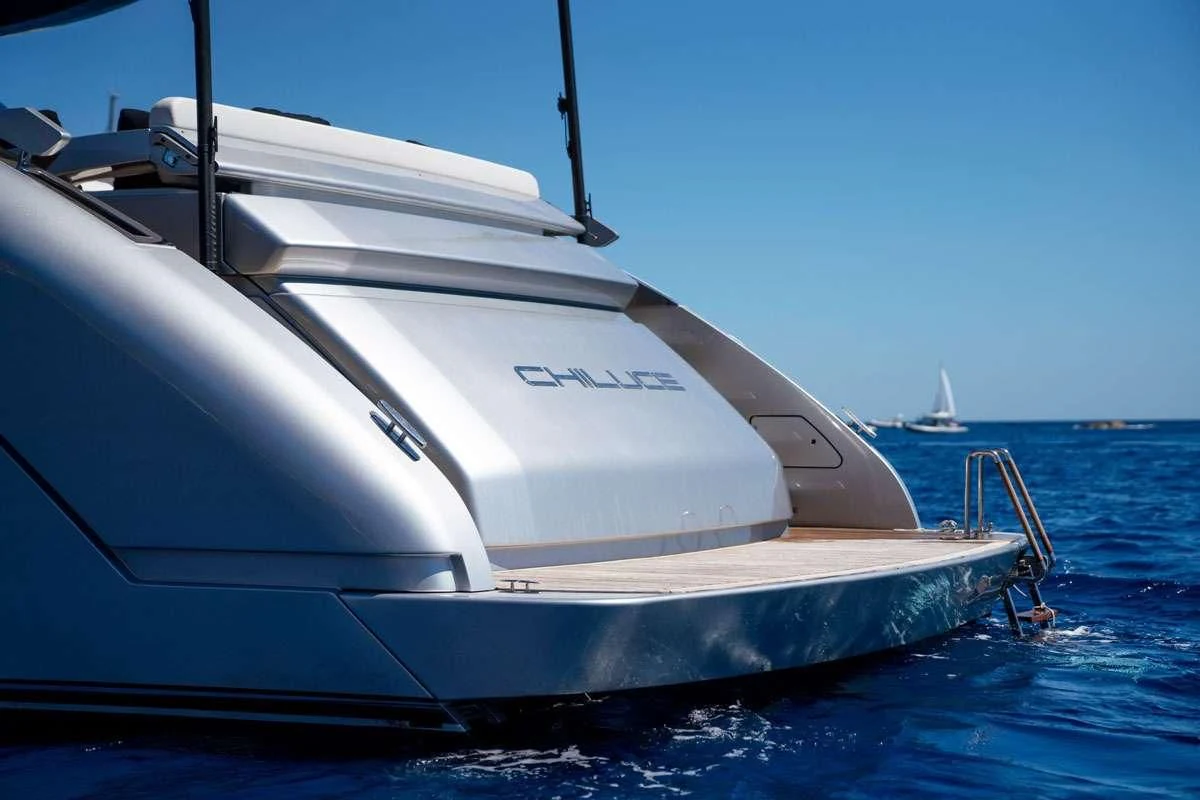 a white boat on the water aboard CHILUCE Yacht for Charter