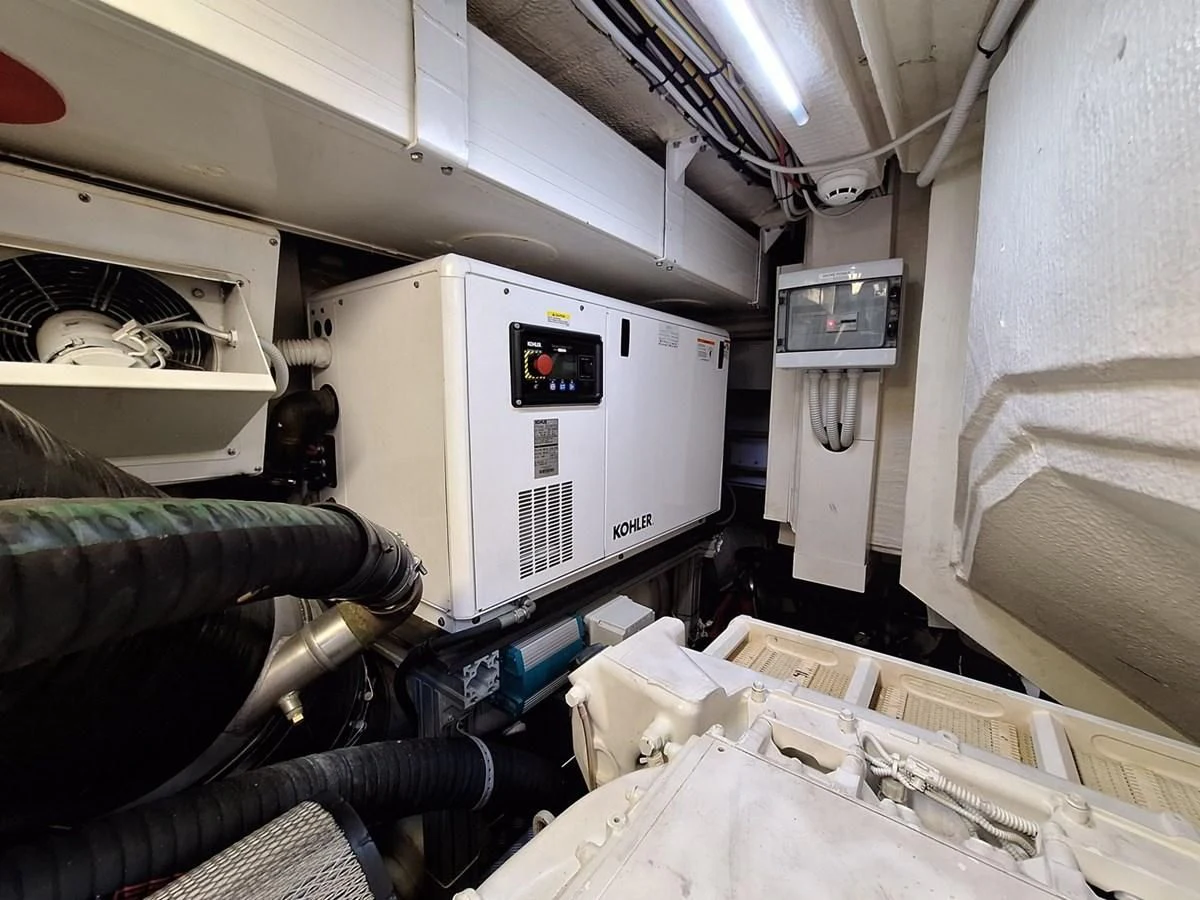 a room with a machine and equipment aboard CHILUCE Yacht for Charter