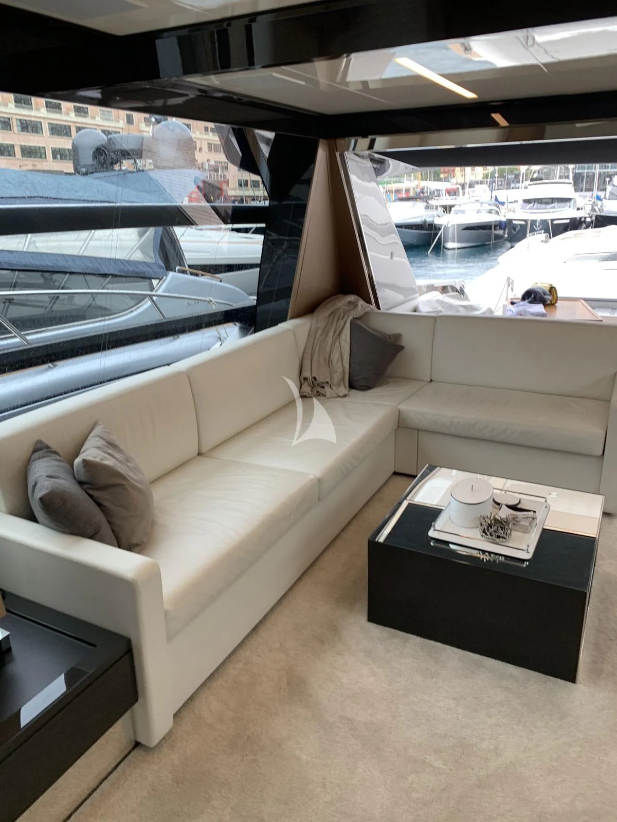 a couch in a room aboard CHILUCE Yacht for Charter