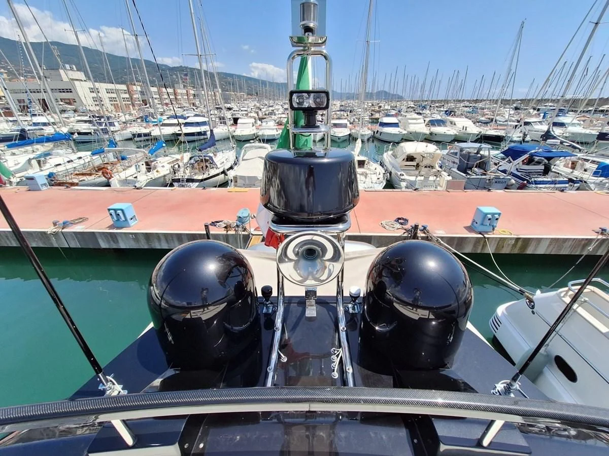 a couple of helmets on a boat aboard CHILUCE Yacht for Charter