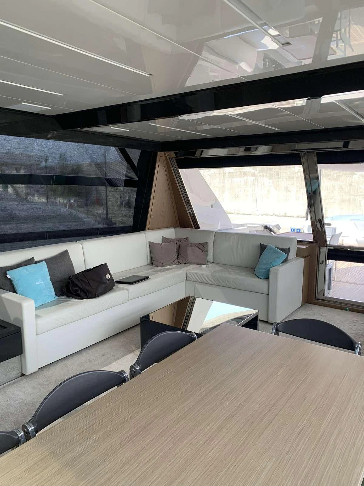 a room with a couch and a table aboard CHILUCE Yacht for Charter