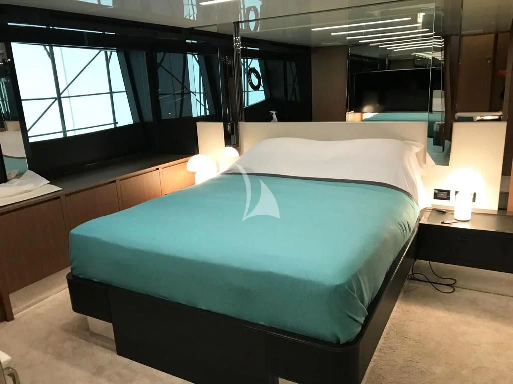 a bed in a room aboard CHILUCE Yacht for Charter
