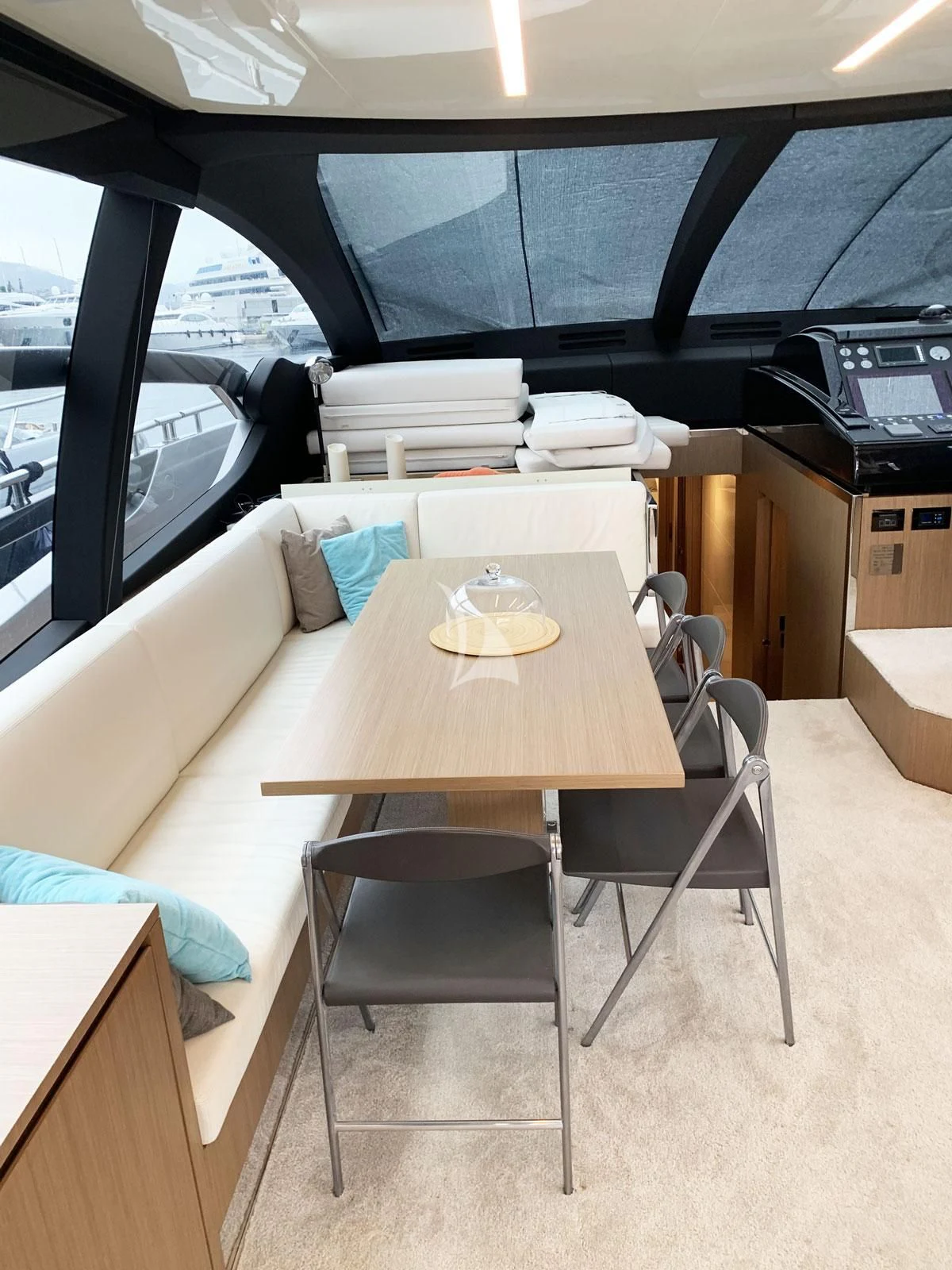 a room with a couch and a table aboard CHILUCE Yacht for Charter