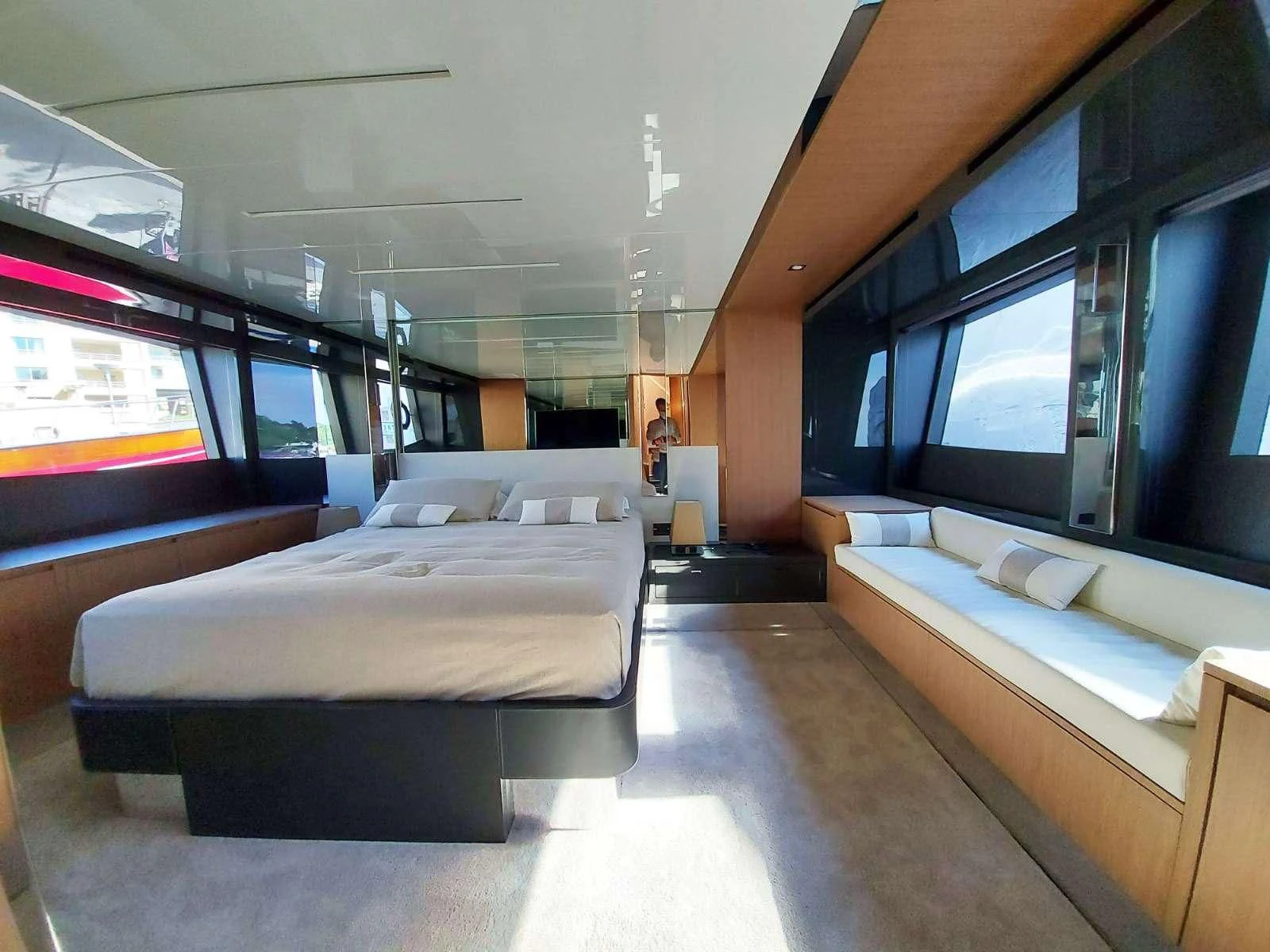 a room with a bed and a window aboard CHILUCE Yacht for Charter