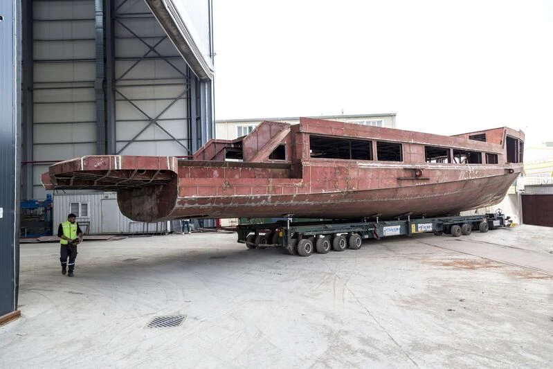 a large ship in a warehouse aboard WATERLILY Yacht for Sale