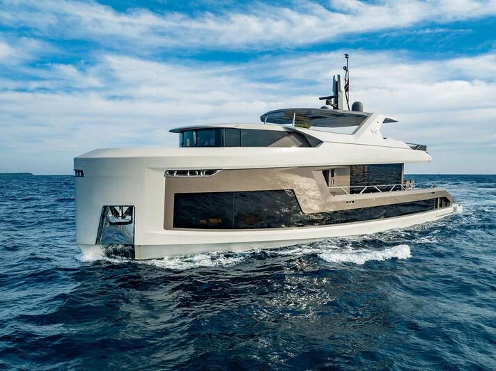 a white boat on the water aboard WATERLILY Yacht for Sale