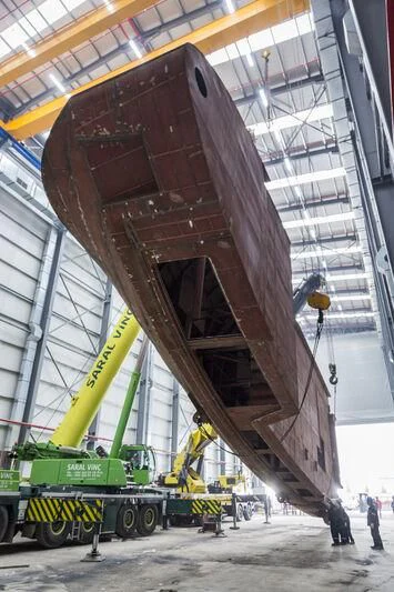 a large crane in a factory aboard WATERLILY Yacht for Sale