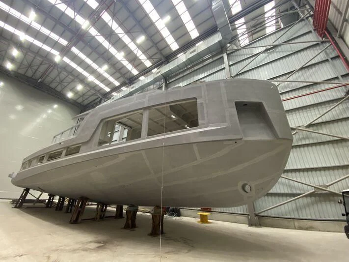 a large white airplane in a hangar aboard WATERLILY Yacht for Sale